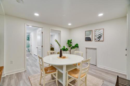 a white dining room with a white table and chairs at Luxurious 2BD family friendly, central in Philadelphia