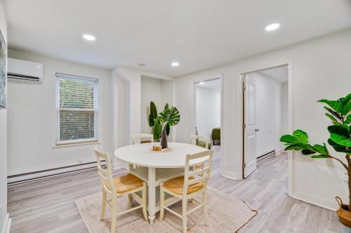 a white dining room with a white table and chairs at Luxurious 2BD family friendly, central in Philadelphia