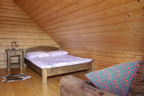 Llit o llits en una habitació de Kotelnica Resort