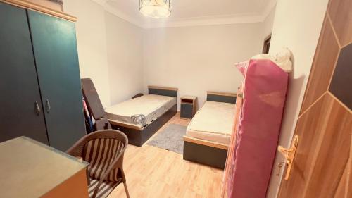 Katil atau katil-katil dalam bilik di Luxury Stay at Mokktam Heights