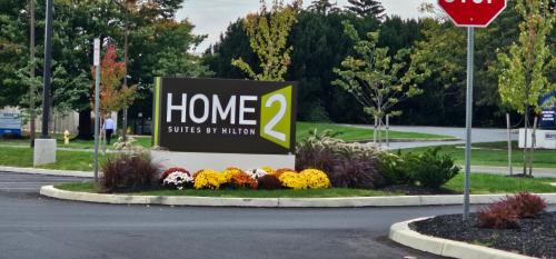 a sign for a home studies of autism at Home2 Suites By Hilton Allentown Bethlehem Airport in Bethlehem