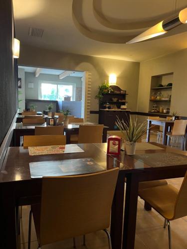 a dining room with a table and chairs at Bed & Breakfast La Rondinella in Cerasolo