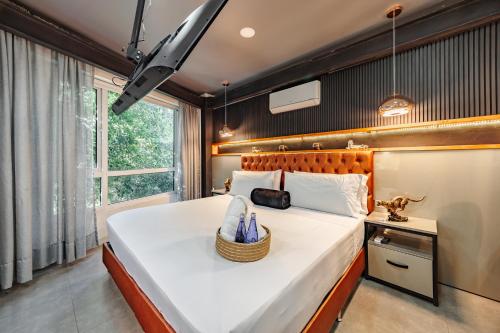 Ein Bett oder Betten in einem Zimmer der Unterkunft One Apartments Laureles