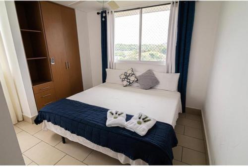 Postel nebo postele na pokoji v ubytování Céntrico con hermosa vista en la ciudad de Panamá