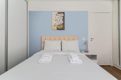 Ένα ή περισσότερα κρεβάτια σε δωμάτιο στο A 200m do Beiramar Shopping #CA05