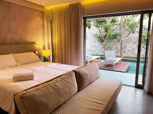 Ένα ή περισσότερα κρεβάτια σε δωμάτιο στο Flat Île de Pipa Creta - By Almare