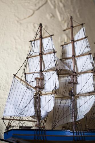 a model of a pirate ship on a table at Ippokampos in Hydra