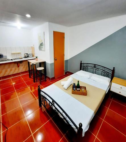 Kuchyň nebo kuchyňský kout v ubytování Studio type unit - Host Homes Apitong