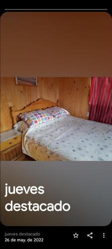 En eller flere senge i et værelse på Hostal kenita