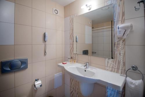 Ett badrum på Hermes Club Hotel - Ultra All Inclusive