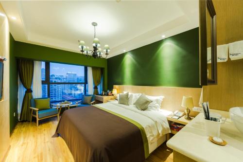 Katil atau katil-katil dalam bilik di Novo Hotel Chongqing