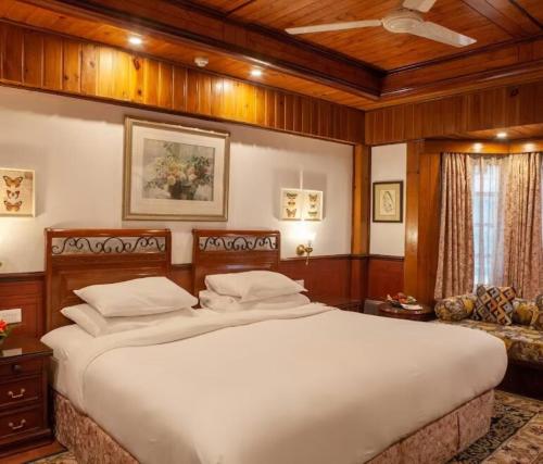 Cama o camas de una habitación en Mayfair Darjeeling