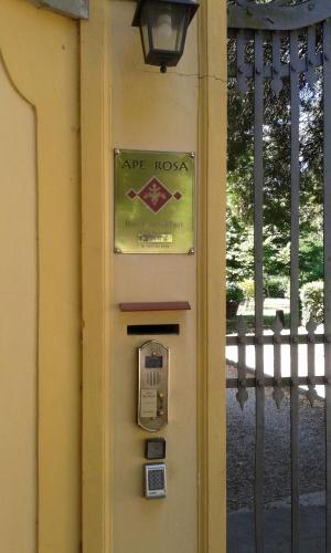 a pay meter on the side of a building at Villa Ape Rosa Relais in Florence