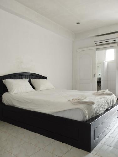 Кровать или кровати в номере SP.Place Hotel Koh Chang