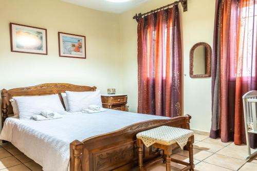 Ένα ή περισσότερα κρεβάτια σε δωμάτιο στο Golden Nest