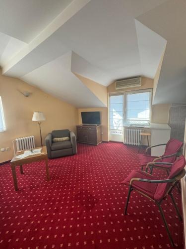 TV a/nebo společenská místnost v ubytování Ada Apartments