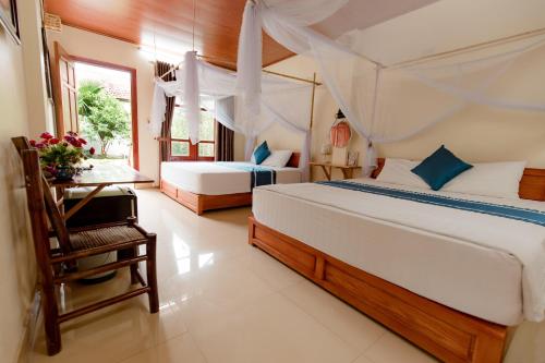 Giường trong phòng chung tại Tam Coc Luxury Homestay