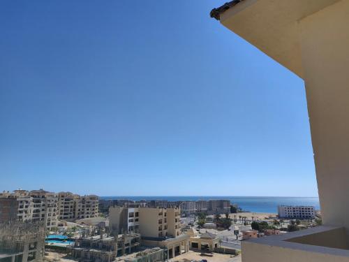 a view of the city from the balcony of a building at Cordoba Suites in Hurghada