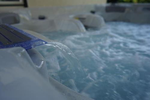 a close up of a bed covered in ice at Secret Garden Vendégház in Pécs