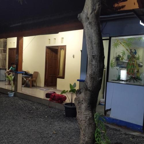 a view of a house from the outside at ijen Traveller homestay in Giri