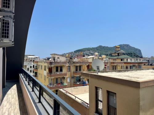 a view of a city from a balcony at New apartment by Cleopatra in Alanya