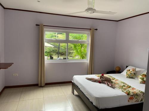 Katil atau katil-katil dalam bilik di Mokara Holiday Apartment