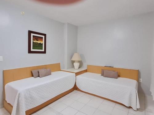 Katil atau katil-katil dalam bilik di Hotel Gumz