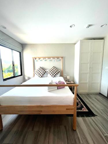 a bedroom with a large bed and a large window at А2 ВАТСАП669З582I976 примем РУБЛИ in Nai Yang Beach