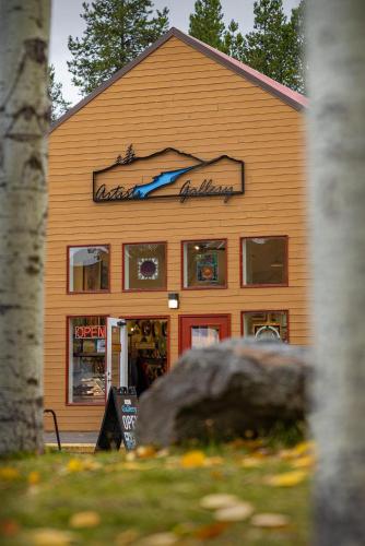 an orange building with a sign in front of it at Big Leaf - Unit 6 in Sunriver