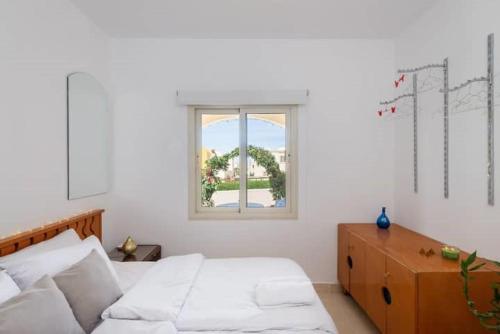 Cama o camas de una habitación en Makadi Heights Elite Worldwide Residences - Hurghada, Egypt