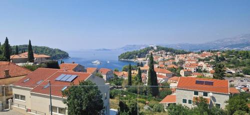 a view of a town with a body of water at Apartments Rilovic, City and Sea view apartments in Cavtat