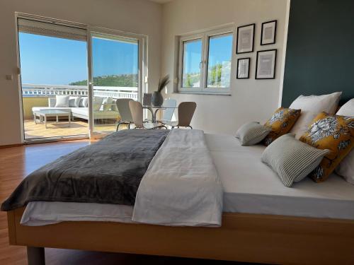 Ένα ή περισσότερα κρεβάτια σε δωμάτιο στο Kavajin Rooms