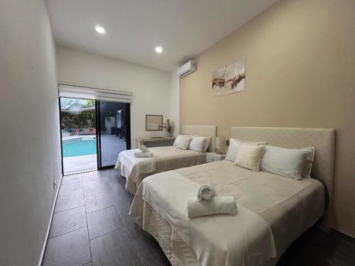 Célèbre VILLA VENUS Playacar - 24 Pax 객실 침대