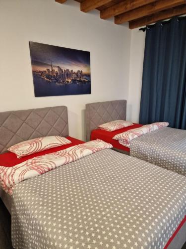 Haus im Grünen tesisinde bir odada yatak veya yataklar