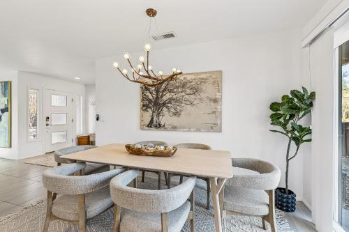 a dining room with a table and chairs at Trendy 3BR in Sedona: Hot Tub/Fire-pit /Central Location in Sedona