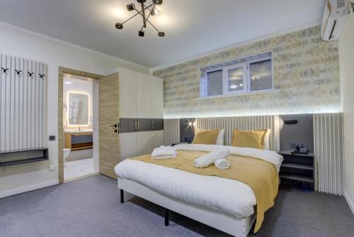 Postel nebo postele na pokoji v ubytování Viva Hotel