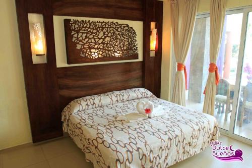 Villas Dulce Suenosにあるベッド