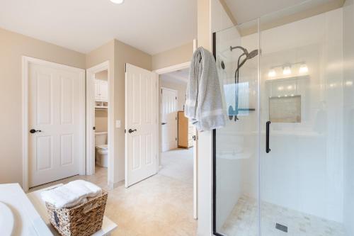 a bathroom with a shower and a glass shower stall at 3BR 2,5BA - Ready to move in - utensils, furniture and appliances in Renton