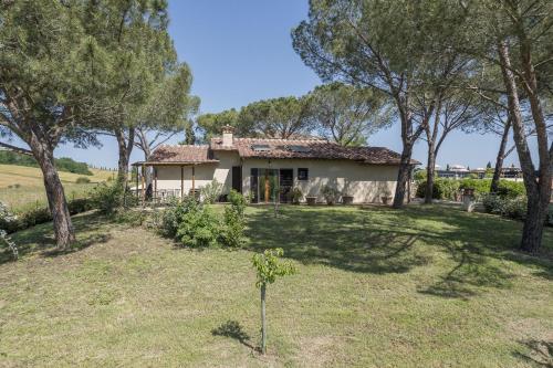 a house in the middle of a field with trees at Anilde, house with private pool, Colle di Val d'Elsa, Toscana in Colle di Val d'Elsa