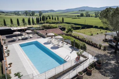 an external view of a swimming pool in a villa at Anilde, house with private pool, Colle di Val d'Elsa, Toscana in Colle di Val d'Elsa