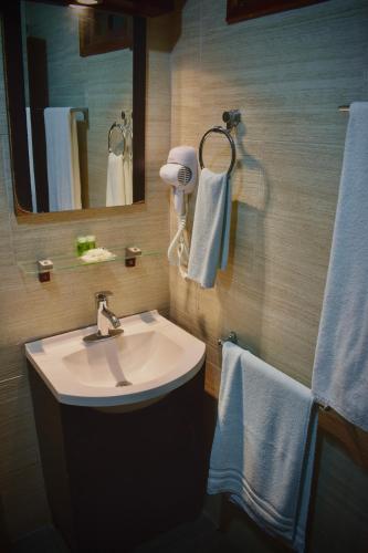 Un baño de El Zaguán Colonial by GuruHotel