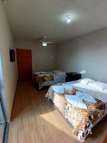 Katil atau katil-katil dalam bilik di Suite 03 - Avenida Hospedagem