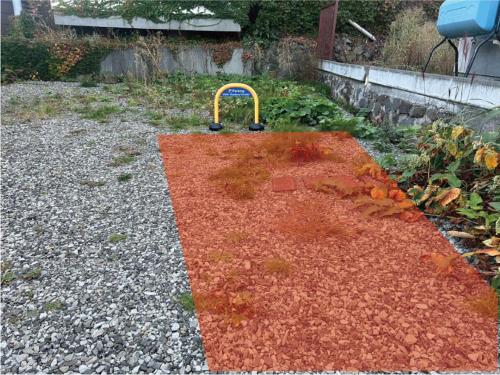 an orange rug with a yellow object on top of it at Cool-Residence OTARU in Otaru