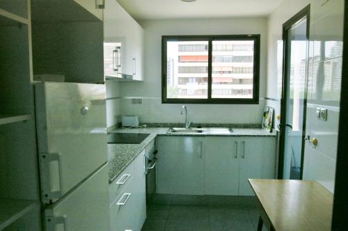 ครัวหรือมุมครัวของ Apartamentos Torre Don Vicente - Arca Rent