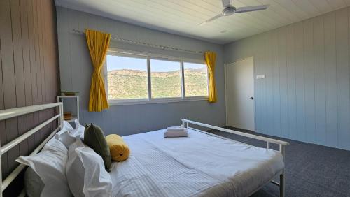 Ένα ή περισσότερα κρεβάτια σε δωμάτιο στο White Lotus Villa