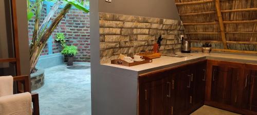 a kitchen with a sink and a counter top at NJ House in Tangalle