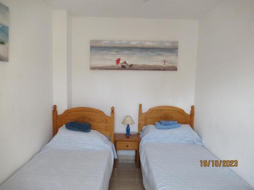 เตียงในห้องที่ Playa Paraiso - Penthouse Apartment - Secure Free Parking and WiFi