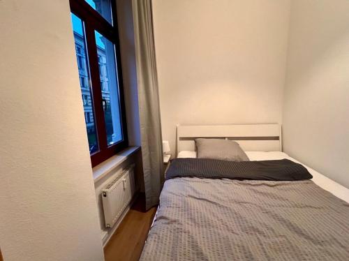 Posteľ alebo postele v izbe v ubytovaní Ferienwohnung Waldstraßenviertel