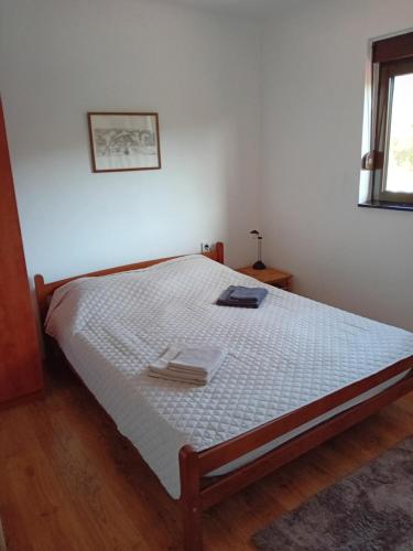 Postel nebo postele na pokoji v ubytování Lucha apartman