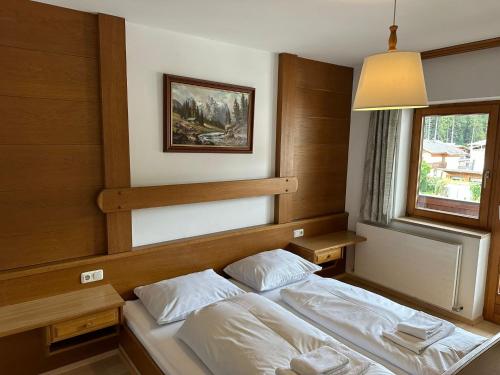 Ein Bett oder Betten in einem Zimmer der Unterkunft Pension Kaiserstubn